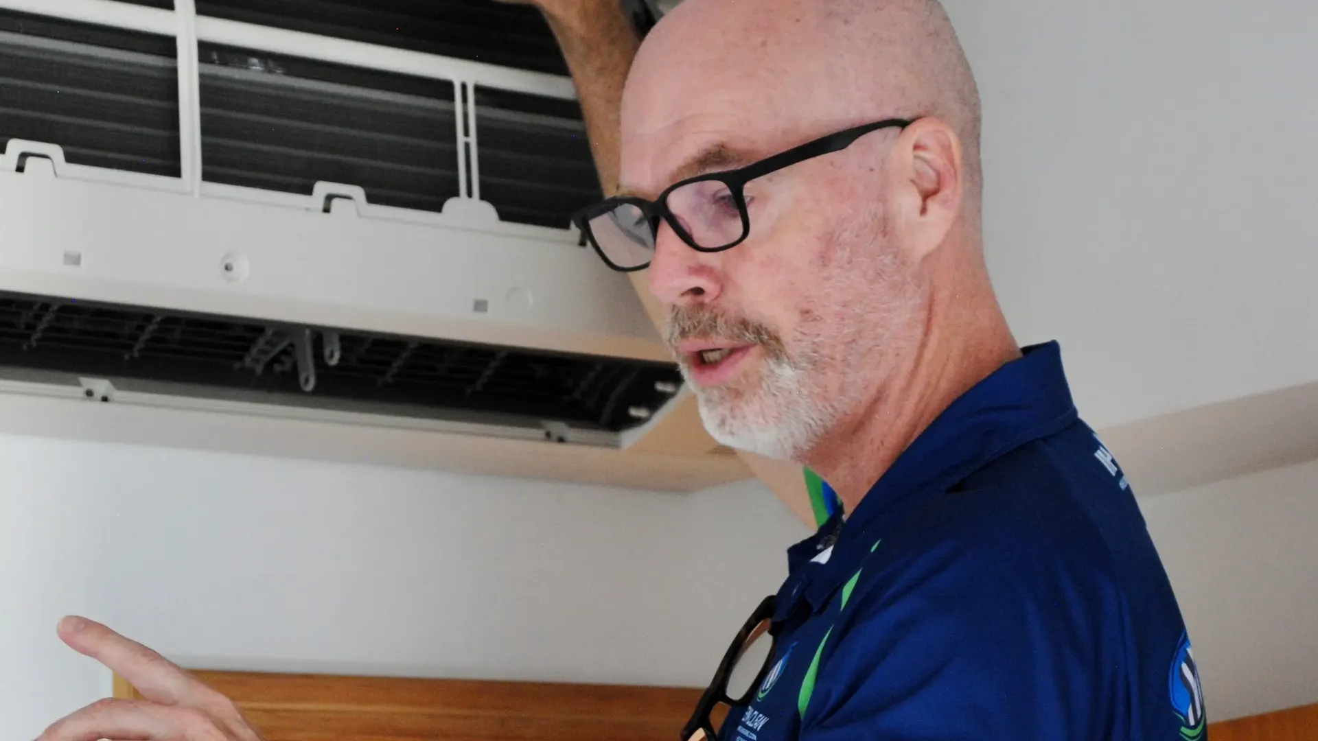 Green Clean technician in branded uniform at a Hong Kong property